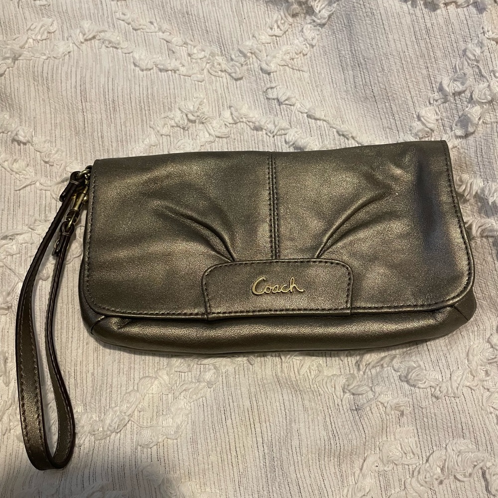 Coach wristlet in bronze leather